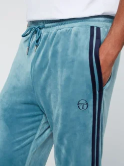 Tracksuits|Sergio Tacchini Debossed Damarindo Velour Track Pant- Larkspur