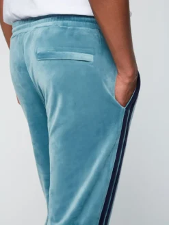 Tracksuits|Sergio Tacchini Debossed Damarindo Velour Track Pant- Larkspur