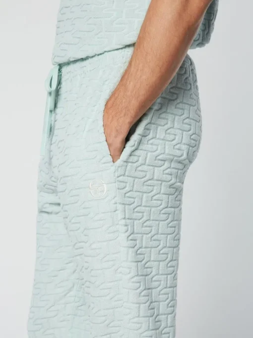 View All|Sergio Tacchini Livata Monogram Track Pant- Surf Spray